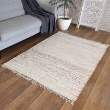 handloomed area rug in ecru with cotton