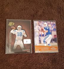 Working with his three sons, cooper, peyton, and eli, archie hosts the manning passing academy each summer. Lot Of 2 Peyton Manning Cards Jun 21 2020 B C Collectibles In Tx