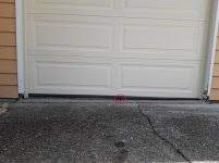 severely uneven gap at garage door