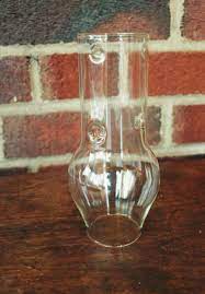 small clear glass hurricane oil lamp