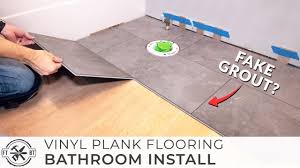 Open the boxes of lifeproof vinyl flooring. How To Install Vinyl Plank Flooring In A Bathroom Youtube