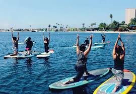 why we love paddle board yoga and you