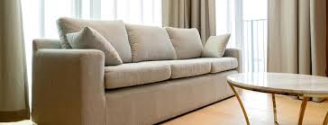 Close Up Light Beige Fabric Sofa With