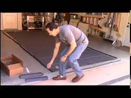 emble the clean park garage mat