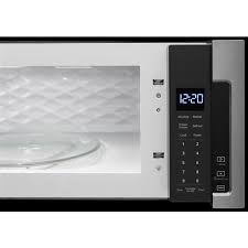 The all in one convenience of a conventional microwave and hood with a powerful 385 cfm ventilation system. Whirlpool 30 In Low Profile Microwave Hood Combination 1 1 Cu Ft Over The Range Microwave Stainless Steel Lowe S Canada