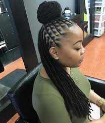 If you are looking for something bold and bright, then this is the style for you. Amazing Simple Short Dreadlocks Styles For Ladies By Black Kitty Family Medium
