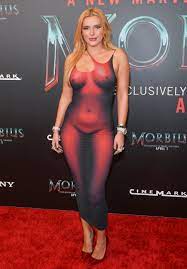 Bella Thorne wears red 'naked' dress at 'Morbius' screening