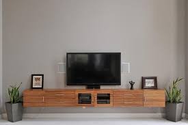 So in this post, i'm sharing how to build a modern floating vanity that could also make a great floating tv stand as well! 10 Modern Floating Media Cabinet For The Living Room Rilane Living Room Tv Cabinet Designs Living Room Cabinets Living Room Tv Cabinet