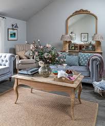 Design ideas for a country living room in gloucestershire with grey walls, dark hardwood flooring, a wood burning stove, a wall mounted tv and brown floors. 20 Country Living Room Ideas Cozy Decor Inspiration Country
