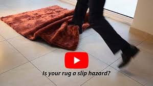 how to stop rugs moving and slipping
