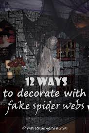fake spider webs and creepy cloth