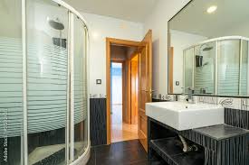 Bathroom With Black Wood Framed Mirror