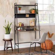 The top ladder style shelves can be used to display pictures and decorative pieces, while the closed storage area can be dropped down into a desk. 8 Best Ladder Shelf Desks Vurni