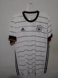 On the chest the german eagle and the four stars. New Season Germany Home Football Shirt 2019 2021