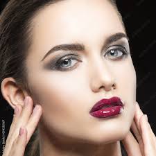 red lipstick smokey eye shadow