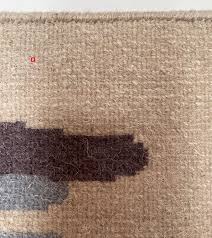 how to tell if a rug is hand knotted