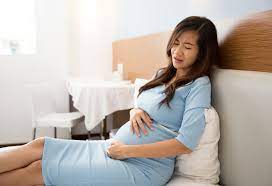 stomach pain while pregnant causes