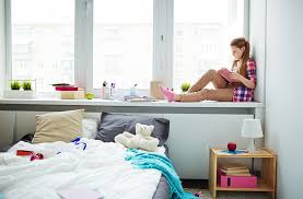 a teenage girl organize their room