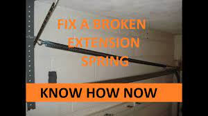 replace a garage door extension spring