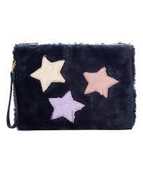black star faux fur cosmetic bag