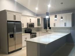 Get your kitchen or bath cabinets professionally replaced by hiring pinellas custom cabinets, inc. Key Largo Kitchen With White Shaker Cabinets