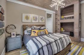 While the walls are painted in dark gray and yellow, the ceiling, sink, and bathtub are in white to avoid overcrowded feeling. Stylish Gray Yellow Bedroom Designs Designing Idea