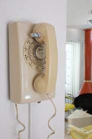 Beige Rotary Wall Phone By Bell Systems