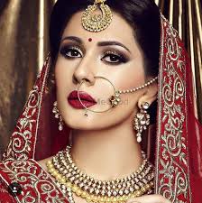 red and gold bridal makeup with smokey eye