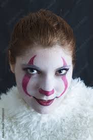 evil clown makeup for a redhead