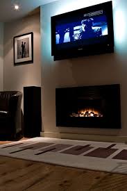 Tv Mounted Above Fireplace