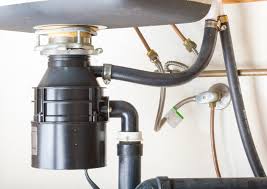 how to fix a garbage disposal when the