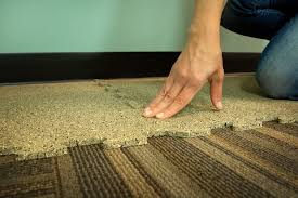 install rubber gym flooring over carpet