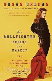 the bullfighter checks her makeup by