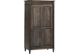 Armoires and wardrobes often have hanging spaces. Millcraft Eminence Traditional Solid Wood Wardrobe With Hanging Rod Wayside Furniture Armoires
