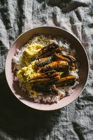 eggs and soy glazed sardine over rice