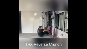 how to perform the trx reverse crunch