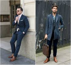 If you are wearing a suit then don't be afraid to mix it up a little bit with color and pattern. Brown Chelsea Boot With Blue Suit Mensoutfitswithboots Mens Outfits Latest Mens Fashion Chelsea Boots Style