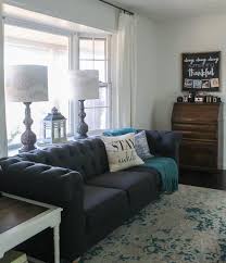 the perfect inexpensive gray tufted sofa