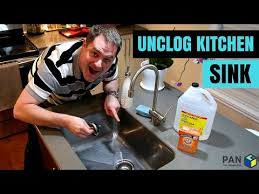 unclog a kitchen sink using baking soda