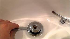 Remove the trip lever and linkage from the overflow drain. So Easy How To Remove A Watco Pop Up Drain Plug Youtube