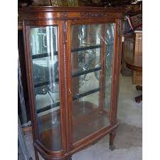 oak curved glass china cabinet carving