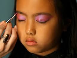 applying makeup on children exposes