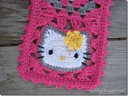 Close Up Of Hello Kitty Crochet Granny Square With Flower
