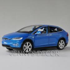 Just need a garage and power source to plug it in daily. Diecast 1 32 Car Model Toys Tesla Model X 90d Pull Back Replica With Sound Light Ebay