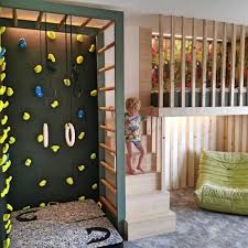 room features a diy climbing wall