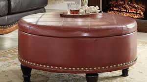 This ottoman is filled with synthetic bean filling that gives it its shape, and offers a cushioned spot to sit or kick up your feet during movie night. 10 Best Round Leather Storage Ottoman Coffee Tables Homeluf Com