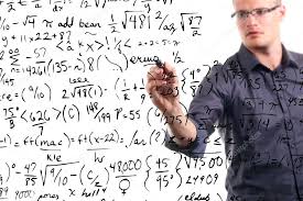 Man Writes Mathematical Equations On