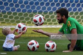 Alisson ramses becker (born 2 october 1992), sometimes shortened to alisson, is a brazilian professional footballer. Topshot Brazil S Goalkeeper Alisson Players With His Daughter Goalkeeper Football World Cup