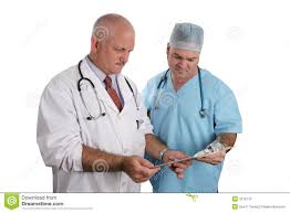 Doctors Review A Chart Stock Photo Image Of Mature Aged