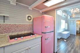 tiny home with retro style pink kitchen